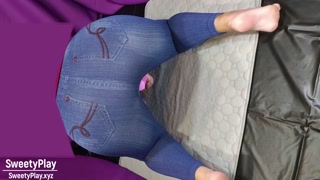 Big ass in jeans peeing with vibrator