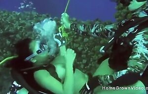 Fucking this busty cutie underwater while scuba diving