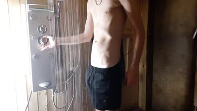 Guy fingering in the shower after work