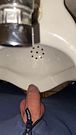 I pee into the urinal hands-free, through my foreskin.