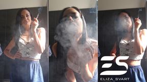 Sunkissed smoking in blue velour pants
