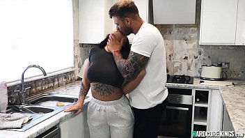 Busty brunette gets anal in the kitchen