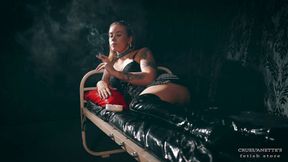 Smoking in black lingerie