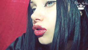 Red lips with golden glitter
