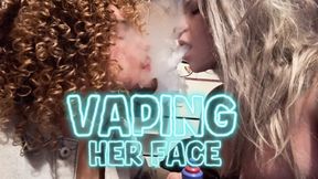 Vaping her face