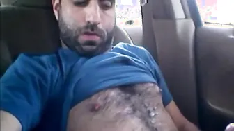 Hairy bear jerks off and cums in his car