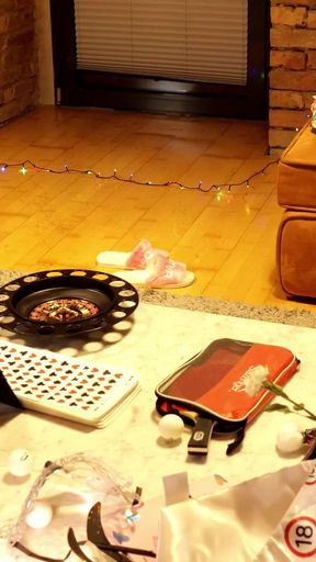 Two girls one guy handjob challenge party for Christmas with presents and roulette spinning   Clip 1