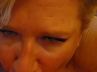 This hot blonde giving this stud a blowjob