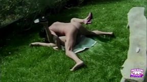 Drilled brunette with massive melons takes a handjobs in the field, gets