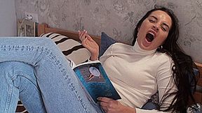 Yawns in front of a book!!! (1920x1080 Full HD) MP4