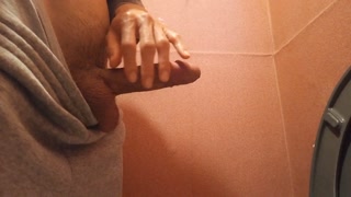 Look! This gay twink can't help but jerk off his morning erection after peeing, and is holding back from ejaculating