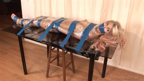 Tasty Dish Jana Jordan Struggles On The Tabletop Wrapped In Plastic And Tape!