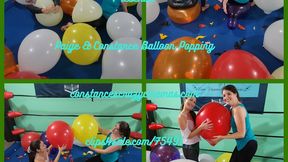 Paige and Constance Popping Balloons