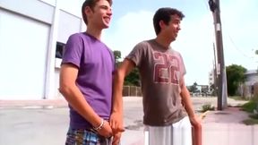 Gay plays with his cock on the streets