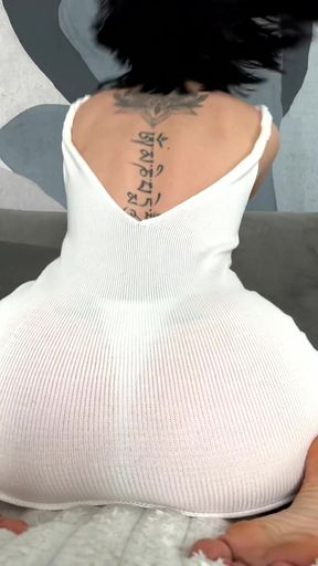 Female Onlyfans Model in White Tank Top