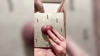 Twink restrained in chains gets his balls toyed with in hardcore BDSM session