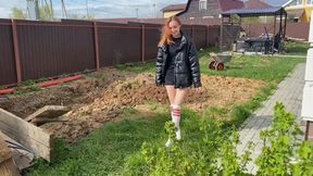A girl gets her white knee socks dirty in very deep mud, where her feet get stuck up to her knees (re-realize)
