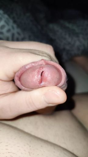 Jizzi teases his cock until the precum is dripping
