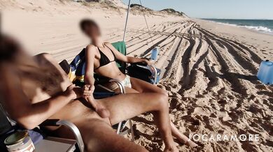 Petite Latina gets a risky beach handjob with big dick cumshot finally unleashed