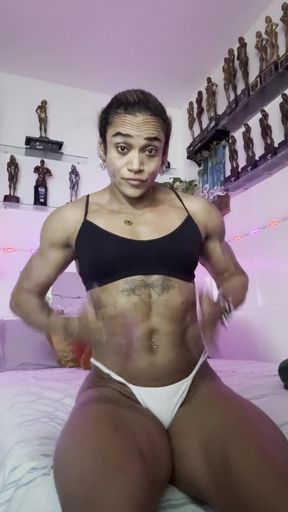 Female bodybuilder in sports bra