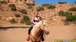 Ridiculously busty Sierra Skye rides the horse