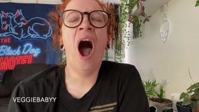 tired girl yawns a lot while getting ready for work - wmv