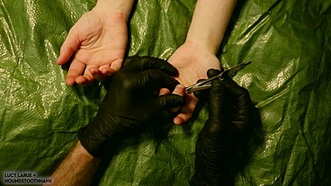 Tarp and Black Nitrile Gloves Fingernail Clipping
