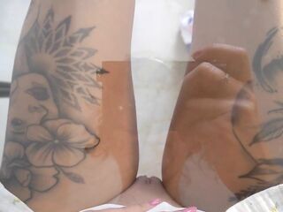 Cutie pees underneath the table whilst expecting for takeaway food