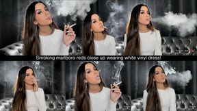 Smoking marlboro reds close up wearing white vinyl dress!