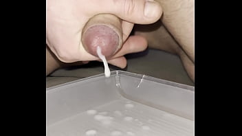 I jerk my dick into a container large ejaculate cum amateur