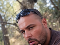 Bear Sucks and Swallows Outdoors