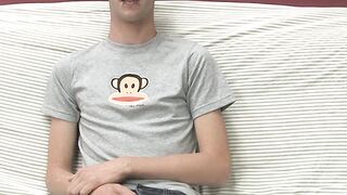 Adorable gay guy Danny jerks off his dick on couch solo