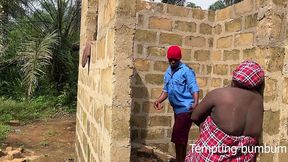 gateman and housemaid having fun in an uncompleted building