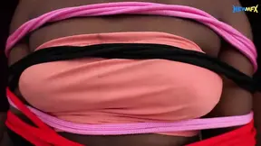 Hot Latina tied to chair in a BDSM setup.