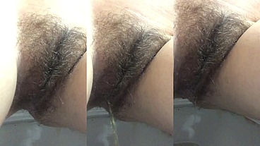 Hairy pussy peeing