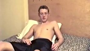 Straight Irish boy Corbin tugs down his boxers and lubes up his 8 inch dick. This guy's a leaker and after stroking it a bit he gives us excellent close-ups of his pre-cum production.