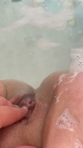 Massaging my pussy in the bath