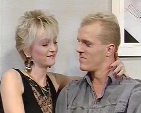 Short hair blonde MILF gets spitroasted in a threesome