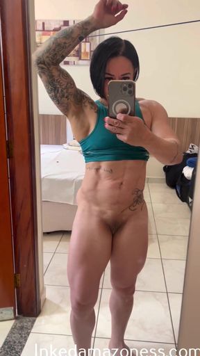 Latina Muscle woman flexing biceps