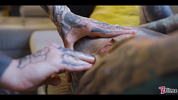 Burlesque tattoo beauty with big boobs gives anal fuck with strap-on