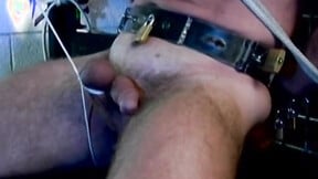 ”Big stud Derek Pain takes a serious punishment in his firm balls”