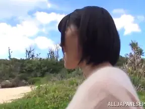 Sizzling Beach Blowjob by Busty Asian MILF Revealing Her Luscious Titties