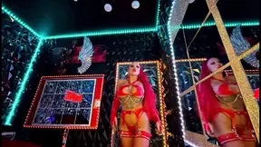 Curvy redhead dominates in dungeon with huge tits and ass