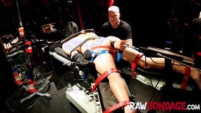 ”Chained jock Devin Franco lying face down being fisted in his booty”