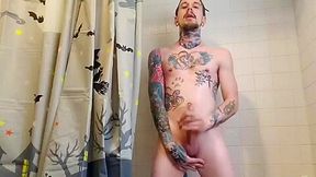 Tattooed Guy Jerking Off Big Dick In Shower