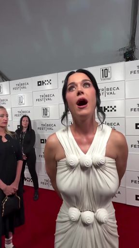 Busty milf shows off her big boobs in a braless video