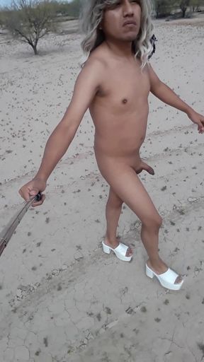 Iconic moment from &quot;Cute trans in mini dress strips naked in public wearing high heels anal plug and hot tight ass&quot;