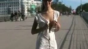 Slim teen gal flashing her titties and pussy in public