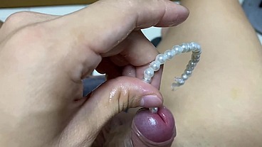 Orgasm by pearl sounding