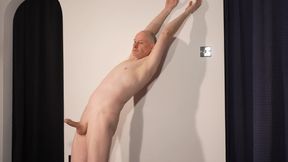 British man posing nude for camera shows body and uncut erect cock as he performs masturbating, presenting his uncut erection